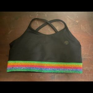 Zumba sports bra. Size large (lovely). Cross back. Colorful shiny band.